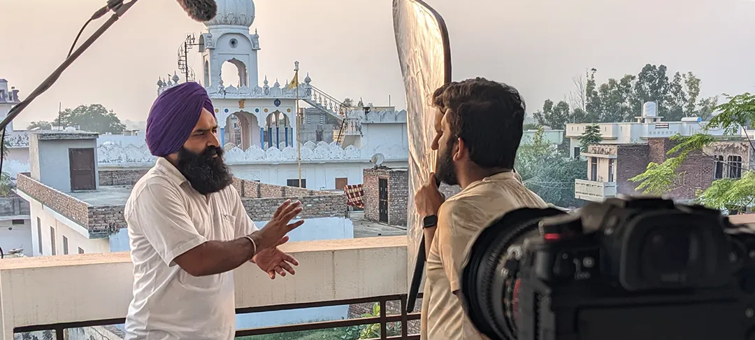 man in India being interviewed for I Migrant documentary